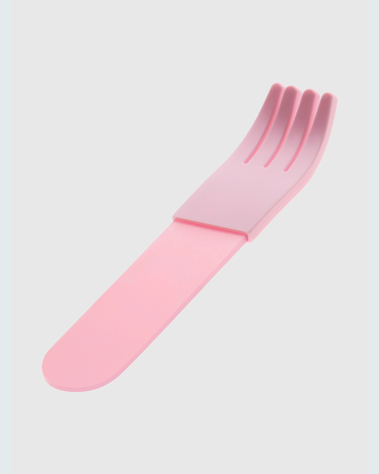 Pink acrylic fork with matching pink silicone sleeve, angled on white background
